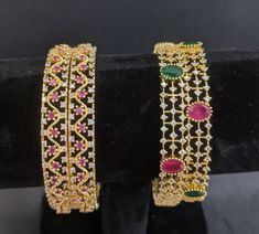 "Gold Plated ruby Classic Fixed Size Gorgeous high-end Bangles, Contemporary set of 2 bangles. These bangles are perfect for any Traditional outfit and super accessory for weddings, engagements, functions, and parties. Ready to ship from FL USA Bangles Sizes to measure for you: 2.2 (2.12\" diameter inner circle) 2.4 ( 2.25\" diameter of the inner circle) 2.6 ( 2.37\" diameter of the inner circle) 2.8 (2.5\" diameter of the inner circle) 2.10 (2.60\"diameter of the inner circle) Care: We don't wa Ruby Jeweled Bangle For Wedding, Traditional Jeweled Bangle For Formal Occasions, Wedding Bangle In Yellow Gold With Ruby, Traditional Jeweled Bangle For Festive Occasions, Traditional Jeweled Bangle, South Indian Jewellery, Temple Jewellery, Bangle Set, Bangles Jewelry