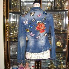 Beautiful Denim Jacket Adorned With Flower And Butterfly Appliqus. Moto Silhouette. Zipper Closure. Unlined. Made Of Cotton, Polyester, Spandex And Other Fiber. Brand New With Tags. Size Xs Trendy Denim Floral Print Outerwear, Trendy Denim Jacket With Floral Print, Trendy Floral Print Denim Jacket, Multicolor Denim Jacket With Patches For Spring, Multicolor Patched Denim Jacket For Spring, Trendy Fitted Pink Denim Jacket, Fitted Floral Print Denim Jacket, Multicolor Denim Jacket For Spring, Spring Multicolor Denim Jacket