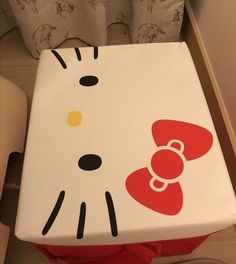 a white box with a hello kitty design on it