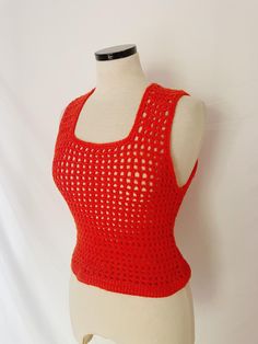 I have loads of shirts to list here. I am making a generic listing and noting key details pertaining to each top. Should you have any questions beyond what details are listed, please send us a message! Enjoy! Brand:  *handmade Style: crochet sleeveless crop top Color: red-orange  Size: n/a Notes: good condition! Pit to pit: 14" Length: 17" Handmade Fitted Casual Tops, Fitted Crochet Tops Made Of Cotton Yarn, Hand Knitted Cotton Tops For Beach, Fitted Hand Knitted Cotton Tops, Handmade Sleeveless Cotton Top, Hand Knitted Fitted Cotton Tops, Handmade Fitted Sleeveless Top, Cheap Red Crochet Top, Red Sleeveless Y2k Crop Top