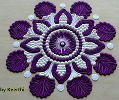 a purple and white circular design on the floor