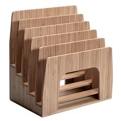 six wooden cutting boards stacked on top of each other