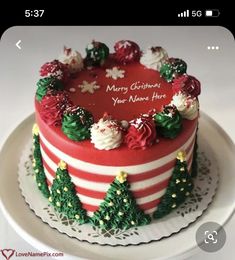 a red and white christmas cake on a plate