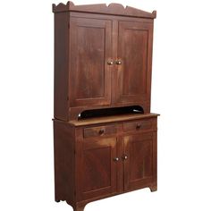 a wooden hutch with two doors and drawers