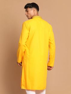 VASTRAMAY Men's Yellow Color Solid Kurta Add a pop of color to your ethnic wardrobe with this vibrant yellow kurta from VASTRAMAY. Made from comfortable fabric, this kurta is perfect for both casual and festive occasions. Features: Color: Yellow Pattern: Solid Fabric: Comfortable Occasion: Casual, Festive Specifications: Brand: VASTRAMAY Fit: Regular Fit Neck: Mandarin Collar Sleeve Length: Long Sleeves Length: Knee-Length Number of Pockets: 2 Side Pockets Material & Care: Material: Cotton Blend Yellow Kurta, Yellow Pattern, Hot Outfits, Mandarin Collar, Yellow Color, Knee Length, Color Pop, High Neck Dress, Cotton Blend