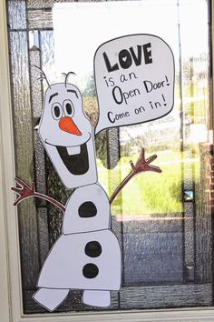 the frozen queen door is decorated to look like she has an open door sign on it