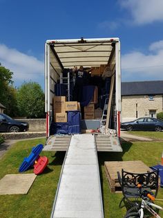 the back of a moving truck with its door open