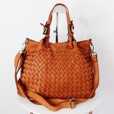 "Cognac Woven Leather Bag, Soft Woven Handbag, Leather Tote Woman, Handmade Shoulder Bag, Large Tote Bag, Modern Leather Crossbody Bag, Elow comes in two versions, LARGE: W 15\" x H 11.4\" x D 7.1\" & SMALL: W 13\" x H 10\" x D 6\". Handle drop: 4\" This bag has made by our italian partner and customizable by our team. We offer one free monogram or name personalization. Please check fonts, color thread, tag samples and leave your monogram or name to embroider. Features: Inside: The bag closes wi Leather Shoulder Bag With Handles In Cognac, Cognac Leather Shoulder Bag With Handles, Brown Top Handle Bags With Leather Handles, Cognac Satchel With Detachable Strap, Cognac Top Handle Bag With Handles, Cognac Top Handle Satchel For Shopping, Cognac Leather Handle Tote Satchel, Cognac Tote Satchel With Leather Handles, Cognac Satchel With Detachable Handle