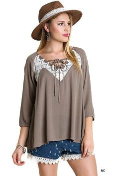 This peasant blouse has a great boho vibe. It features a V lace up neckline, 3/4 sleeves with elastic, lace detailing front and back, a high low hemline, lightweight and has a full cut a-line relaxed silhouette. Small B 40" L 24" : Medium Bust 42" L 24" : Large Bust 44" L 24" back is longer Cheap Fall Peasant Top, Cheap Peasant Top For Fall, Cheap Women's Spring Peasant Top, Affordable Long Sleeve Peasant Top For Women, Affordable Summer Peasant Top For Spring, Affordable Women's Summer Peasant Top, Cheap Spring Peasant Top For Daywear, Affordable Peasant-style Women's Blouse, Cheap Peasant Style Long Sleeve Tops