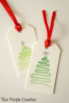 two tags with christmas trees on them