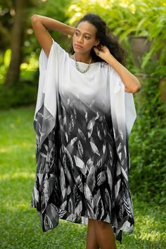 This unique asymmetrical caftan can be worn as a dress, loungewear, or coverup at the pool or beach. The cool cotton fabric transitions from white to grey to black, with a print of falling leaves that is created using the batik method. Thai artisan Akkaraphon hand-paints the fabric with patterns in wax before it is dyed. Asymmetrical Clothes, Dress Loungewear, Blue Wrap Dress, Cotton Caftan, Tunic Pattern, Design Dresses, Falling Leaves, Caftan Dress, African Design Dresses