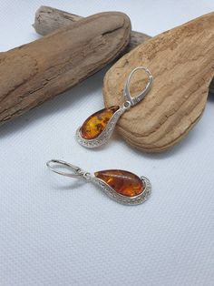 Baltic Amber and sterling silver 925. Stunning big earrings. With hallmarks. Length 4.5 cm https://www.etsy.com/shop/AmberLithuania?ref=simple-shop-header-name&listing_id=780205095&section_id=27948198 Gift Teardrop Earrings With Lever Back Ear Wires, Classic Silver Teardrop Earrings Gift, Gift Teardrop Earrings With Lever Back, Sterling Silver Teardrop Earrings With Lever Back For Gifts, Gift Sterling Silver Teardrop Earrings With Lever Back, Silver Teardrop Pendant Earrings As Gift, Amber Teardrop Earrings Gift, Amber Teardrop Earrings As A Gift, Amber Teardrop Drop Earrings For Gift