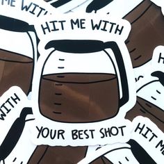 some stickers that say hit me with your best shot and have coffee in them