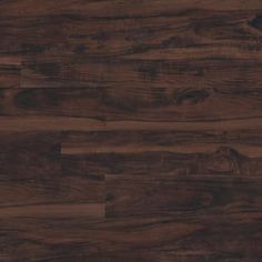 wood flooring that looks like it has been made from the same material and is dark brown