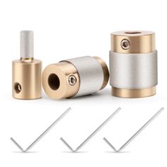 three different types of gold and silver metal parts