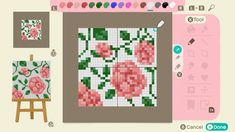 a computer screen with an image of flowers on it and other crafting supplies next to it