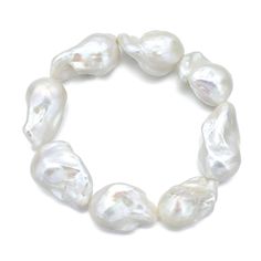 ~ Large White Baroque Freshwater Pearl Stretch Bracelet ~ Ready To Ship In Size Medium ~ Using the same large baroque freshwater pearls ( 3/4-1 Inch ) used for all of the earrings and necklaces in the Nuit Blanc Collection this statement bracelet is perfect for day or night, summer or winter ( try it over a long sweater sleeve or long fitted glove ) as well as a spectacular piece for brides. ~ This all-stretch bracelet is available in 3 sizes: S: 7-7.5 Inches / 17.78 cm - 19.05 cmsM: 7.5-8 Inche Pearl Bangle Bracelet, Pearl Lariat Necklace, Night Summer, Chunky Pearls, Freshwater Pearl Jewelry, Pearl Bangle, Pearl Jewelry Sets, Baroque Pearl Earrings, Baroque Pearl Necklace