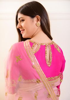 7 yards of pure luxury, indulge in “ Zeb “ adorned on pure organza in a dreamy pastel teapink shade with hand blocked motifs in an gold. The blouse is on pure raw silk 80 gms with intricate gold zardosi, for timeless elegance. The length of the saree blouse is 14 inches.You can mention your customised blouse size at th Pink Raw Silk Blouse Piece For Reception, Pink Kundan Saree, Gold Chanderi Sharara For Reception, Pink Traditional Wear With Gota Work For Designer Occasions, Elegant Pink Chanderi Choli, Pink Silk Choli With Resham Embroidery, Pink Tissue Silk Choli With Resham Embroidery, Traditional Drape Organza Blouse For Wedding, Elegant Pink Cutdana Choli