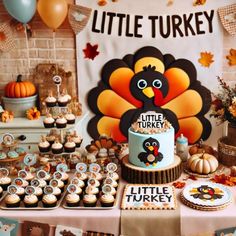 a little turkey birthday party with cupcakes, cookies and desserts on the table