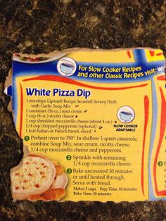 a box of white pizza dip sitting on top of a granite countertop with instructions for how to make it