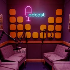 a purple room with two chairs and a microphone in front of a neon sign that reads'radiocast '