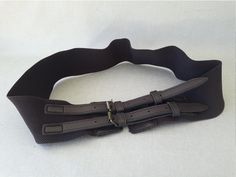 "Light dark brown elastic band with fake leather on the front. Impressive closure! Measurements approx Total length of open belt 80cm / 31.5, and stretched 100cm / 39.5 \"+ buckle. Buttoned the smallest size you become is 40cm / 16 '' and stretched reaches 46cm / 18 '' Width: 6cm / 2.2 \" Good vintage condition See photos for better details                                    Thank you for visiting my shop" Adjustable Brown Fabric Belt, Bakelite Bracelets, Pink Ceramic, Suspender Belt, Vintage Brown, Suspenders, Vintage Pink, Elastic Band, Light In The Dark