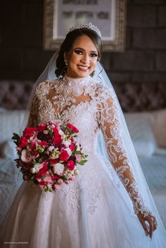 a woman in a wedding dress holding a bouquet