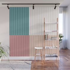 a living room with a ladder, bookshelf and wallpaper in pastel colors