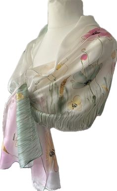 Hand-Painted Silk Scarf - Woman   * Pure Silk Scarf * Hand Rolled Hems * Dye used:  French H-Dupont silk dye  * Gift packed * Each purchase comes with a complimentary gift 💝 This elegant silk scarf features a hand-painted design of assorted, Mixed wildflowers and lush green grace and blue creating a harmonious look. Silk: Ponge 5 Light, delicate, semi - transparent and a bit glossy.  It is a luxurious and thoughtful gift for a lady who appreciates the beauty of handcrafted items and a perfect gift for any occasion as Anniversary, Birthday, Mother's day... The lightweight and delicate nature of silk makes it suitable for wearing in all seasons. This pure silk scarf is meticulously painted with French H-Dupont silk dye and carefully steamed for more than four hours to guarantee that the sca Silk Scarf With Floral Print For Wedding, Artistic Silk Scarves For Weddings, Artistic Silk Scarves For Wedding, Silk Shawl Scarf For Wedding, Artistic Silk Wedding Scarves, Silk Wedding Shawl Scarf, Multicolor Silk Shawl For Wedding, Silk Shawl For Wedding, Spring Wedding Silk Shawl