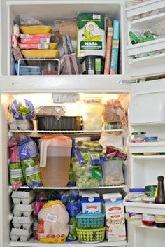 an open refrigerator filled with lots of food