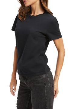 Ultrasoft and effortlessly classic with a crewneck, you'll love wearing this cotton T-shirt just about everywhere. 24 1/2" length (size 1); 27" length (size 5) Crewneck Short sleeves 100% cotton Machine wash, tumble dry Imported Black Owned/Founded Black T Shirt Women, Cutout Shorts, Off The Shoulder Tee, Sheer Sweater, Corset Shirt, American Casual, Latest T Shirt, Good American, Black Stretch