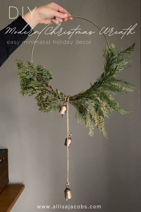 wreath made with gold hoop and cedar Witchy Winter Decor, Natural Wreath Ideas, Diy Nordic Christmas Decorations, White Christmas Wreath Ideas, Witchy Mansion, Hoop Wreath Diy, Allisa Jacobs, Modern Christmas Wreath, Christmas Wreaths For Windows