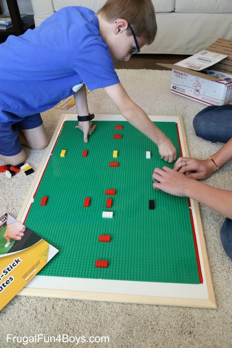 Easy DIY LEGO Wall & Play Board – Frugal Fun For Boys and Girls Lego Boards On Walls, Diy Lego Board, Lego Wall Diy, Diy Lego Wall, Lego Play Table, Lego Tray, Lego Scenes, Lego Table Diy, Book Lessons