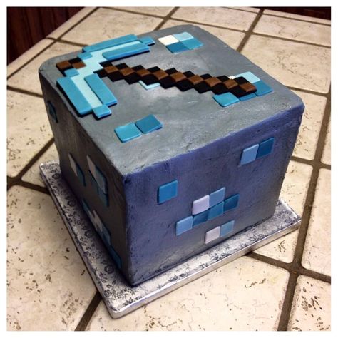 Minecraft Diamond Ore cube cake with pickaxe :) Minecraft Diamond Cake, Minecraft Diamond Pickaxe, Boys 8th Birthday, Climbing Party, Rock Climbing Party, Minecraft Diamond, Diamond Cake, Minecraft Birthday Cake, 8th Birthday Cake