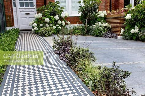 London house with black and white Victorian style tile path with Ilex Crenata Dark Green border and tiled driveway and wood batten bin store in background featuring Hydrangea arborescens Anabelle, Eriobotrya Coppertone standard, Pittosporum tenuifolium Tom Thumb, Carex oshimensis 'Everest' - Japanese Sedge Victorian Driveway, Driveway Ideas Uk, Landscape Design Front Yard, Front Garden Path, Victorian Front Garden, Cedar Trellis, Front Garden Ideas Driveway, Yard Landscape Ideas, Garden Ideas Driveway