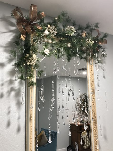 Feminine Mantle Decor, Christmas Mansion Aesthetic, Window Christmas Garland Ideas, Winter Frost Christmas Decor, Christmas Garland Mirror Decor, Double Door Entryway Christmas Decor, Christmas Decorations For Mirrors, Garland Over Mirror Christmas Decor, Christmas Mirror Ideas