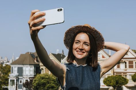 Woman taking a selfie with the Painted Ladies of San Francisco, USA | premium image by rawpixel.com / McKinsey Person Taking Selfie, Painted Ladies San Francisco, Holding Phone, Phone Selfie, Taking Selfie, Freckles Girl, Taking A Selfie, Painted Ladies, California City