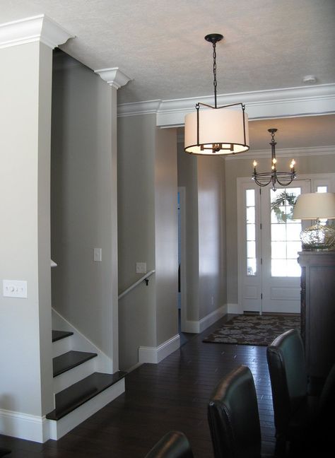 Winchester Foyer | by Wayne Homes Thick Trim, Wayne Homes, Trim Ideas, Love Dark, Floor Molding, Dark Floors, Flooring Ideas, 1st Place, Wall Color