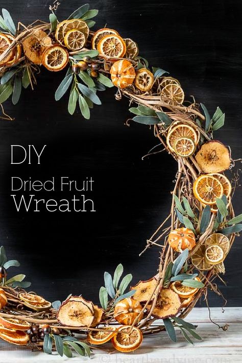 Make your own fragrant and natural wreath with dried fruit and a few artificial bits of greenery. Great for your holiday decor or any time of year. Mabon Decorations Centerpieces, Farmer Christmas Decor, Decorating With Dried Oranges, Dried Fruit Christmas Garland, Dried Fruit Crafts, Dry Fruit Decoration Ideas, Dried Fruit Wreath, Making A Christmas Wreath, Homemade Wreaths Diy