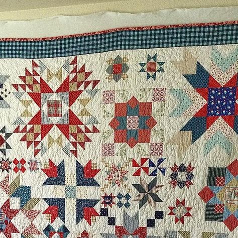 Kar on Instagram: "First of the finishes.  My scrappy red, white and blue Barn Star Sampler Quilt is my favorite to date.  I have collected red, white and blue fabrics for many years in hopes of finding the right pattern for them.  Thanks to @corasquilts for a very inspiring book that took me out of my comfort zone and normal choice of projects.  Thanks for all the great fabric @fijimamaquilts @fatquartershop (and the book) and my most favorite quilt shop ever @jkquilts .  I have included some pics of my most favorite blocks that have my most favorite bits of fabric that are meaningful to me.  One block center has all the states names that have special memories for my husband and I.  Love how that worked out.  And let’s not forget the fabulous quilting from @jkquilts also. 😍😍😍
#karmakes Barn Star Sampler Quilt, Star Sampler Quilt, Quilt Sampler, Blue Barn, Block Center, Blue Fabrics, Sampler Quilts, Out Of My Comfort Zone, Sampler Quilt