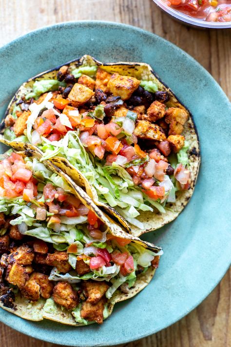 These Vegan Tofu Tacos feature a delectable tofu and black bean chorizo filling, bursting with spices and plant-based protein. Serve them on a corn tortilla with your favorite toppings for a mouthwatering vegan dinner that can be ready in just 30 minutes! Tofu Breakfast Tacos, Vegan Corn Tortilla Recipes, Healthy Vegetarian Tacos, Taco Recipe Vegetarian, Vegetarian Breakfast Tacos, Tofu Tacos Recipes, Plant Based Lunch Ideas, Mexican Vegan Recipes, Mexican Tofu