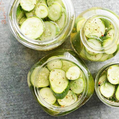 Whether you pile 'em high on burgers or serve them as a snack, a batch of homemade pickles is a tasty potluck recipe. More party recipes: http://www.bhg.com/recipes/healthy/healthy-fall-potluck-recipes/ #myplate Best Dill Pickle Recipe, Crunchy Dill Pickle Recipe, Easy Dill Pickle Recipe, Dill Pickle Recipe, Dill Pickle Chips, Canning Pickles, Pickle Chips, Pickle Recipe, Dill Pickles