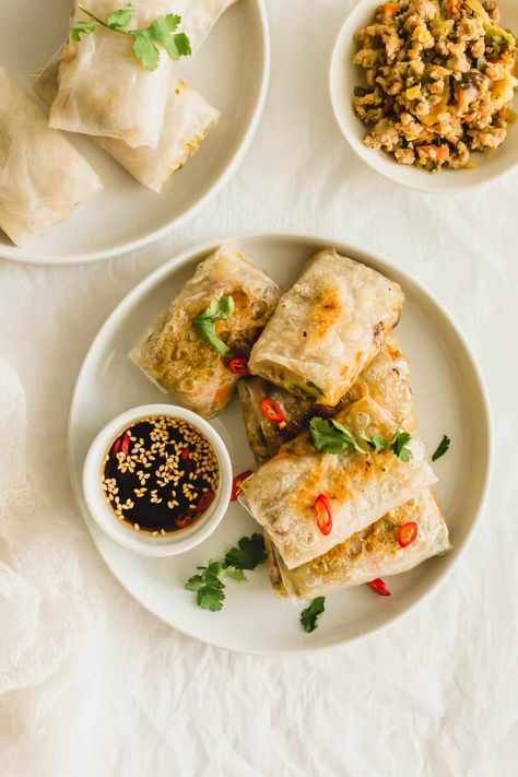 Pan-fried rice paper dumplings on a white round plate with small dish of sauce on the side. Fried Rice Paper, Rice Paper Dumplings, Vietnamese Rice Paper, Recipe For Rice, Rice Paper Recipes, Rice Paper Wrappers, Medieval Banquet, Vietnamese Pork, Fresh Spring Rolls