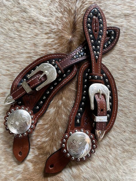 Rich looking PAIR of men's size basketweave tooled leather spur straps.  Medium oil finish. Simple shaped spur straps with the richly tooled leather.  Black leather edge and silver dots.  Engraved silver conchos, buckles and keepers will add an elegant appearance.  These will look attractive on any color boots. ** FREE shipping anywhere in the US **ALL my items listed are ready for shipping!  I ship promptly Mon-Fri.  If you have any questions be sure to message me, I will answer you as quickly as possible.  THANK YOU! Leather Spur Straps, Western Spurs Straps, Spurs Western, Color Boots, Spur Straps, Look Attractive, Silver Engraving, Leather Work, Tooled Leather