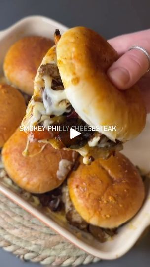 18K reactions · 2.9K shares | Fire up the grill for these mouthwatering Smoky Philly Cheesesteaks! 🍔🔥

Ingredients:
1 lb thinly sliced steak (such as ribeye or sirloin)
2 bell peppers, thinly sliced
1 onion, thinly sliced
4 hoagie rolls
4 slices provolone cheese
Salt and pepper to taste
Olive oil for cooking

Instructions:
Heat a skillet or grill pan over medium-high heat. Drizzle with olive oil.
Season the thinly sliced steak with salt and pepper. Add to the skillet and cook until browned and cooked to your desired level of doneness, about 3-4 minutes per side. Remove from the skillet and set aside.
In the same skillet, add the sliced bell peppers and onions. Cook until softened and slightly caramelized, about 5-6 minutes.
While the vegetables are cooking, split the hoagie rolls and pla Steak Sliders, Olive Oil For Cooking, Philly Cheesesteaks, Hoagie Rolls, Sliced Steak, Cheese Steak, Cooking With Olive Oil, Provolone Cheese, Philly Cheese Steak