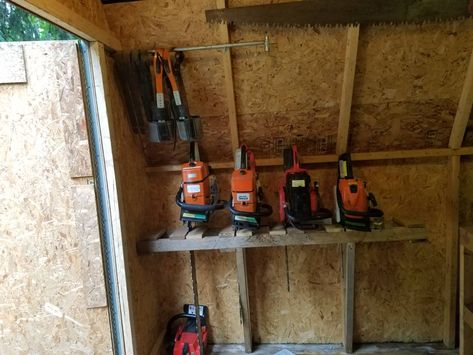 Chainsaw storage | Arboristsite.com Chain Saw Storage Ideas, Chainsaw Organization, Chain Saw Storage, Chainsaw Storage Ideas, Woodshed Ideas, Chainsaw Storage, Atelier Garage, Garage Organizing, Burglar Bars