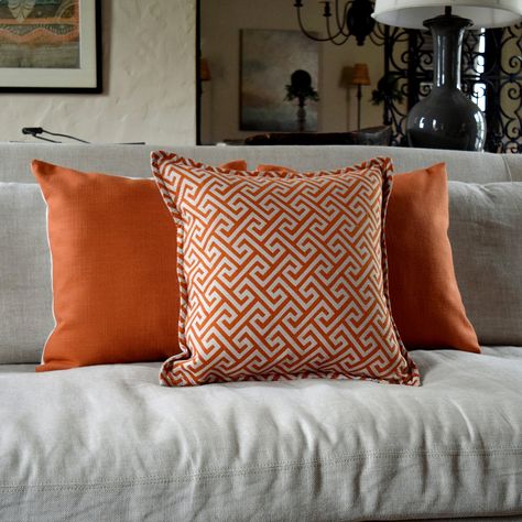 Add an invigorating jolt of energetic color to your home decor with #orange throw pillows!