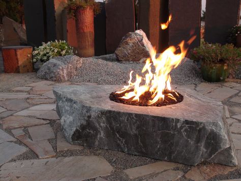 Looking for some distinctive natural stone products to enhance your landscaping project? Building a water feature for your yard and need something special to line it with? Duro Rock can help beautify property. Learn more... http://www.durorock.net/ Natural Fire Pit, Fire Pit With Rocks, Fire Rocks, Easy Fire Pit, Diy Outdoor Fireplace, Fire Pit Lighting, Custom Fire Pit, Outdoor Fire Pit Designs, Modern Fire Pit