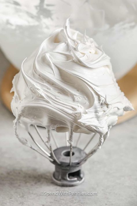 Make homemade marshmallow fluff for a tasty treat that has so many uses! It's the best on a peanut butter sandwich, or it can be used to make the best hot fudge sundae ever. Try it as a fruit dip, or add it to cheesecake filling. So many options for this sweet dessert sauce! #marshmallowfluff #homemaderecipes #easymarshmallowfluffrecipe #spendwithpennies Chewy Rice Krispie Treats, Maple Marshmallows, Marshmallow Sauce, Marshmallow Fluff Recipes, Homemade Marshmallow Fluff, Fudge Sundae, Christmas Baking Cookies, Homemade Marshmallow, Butter Sandwich