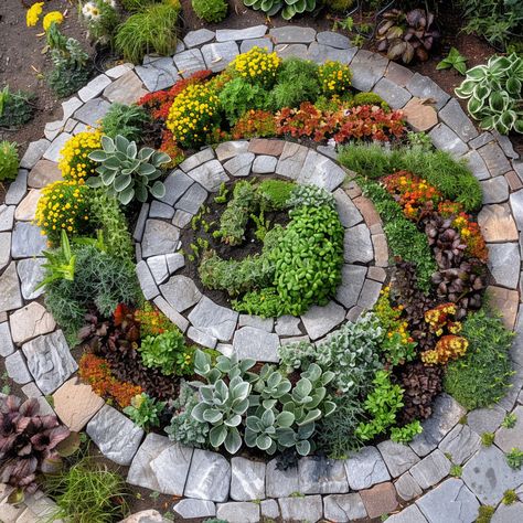 🌿🌈 Spiral Herb Garden with Colorful Culinary Herbs! 🌟✨ This innovative garden design features a spiral structure that maximizes space and provides optimal growing conditions for a variety of culinary herbs. The spiral shape creates different microclimates, allowing you to grow a diverse range of colorful and fragrant herbs in a compact area.🍃 Herb Circle Garden, Spiral Garden Bed, Spiral Flower Bed, Spiral Garden Design, Circular Garden Design, Circular Garden, Backyard Raised Garden, Garden Spiral, Herb Spiral